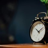 Stylish clock placed on a table